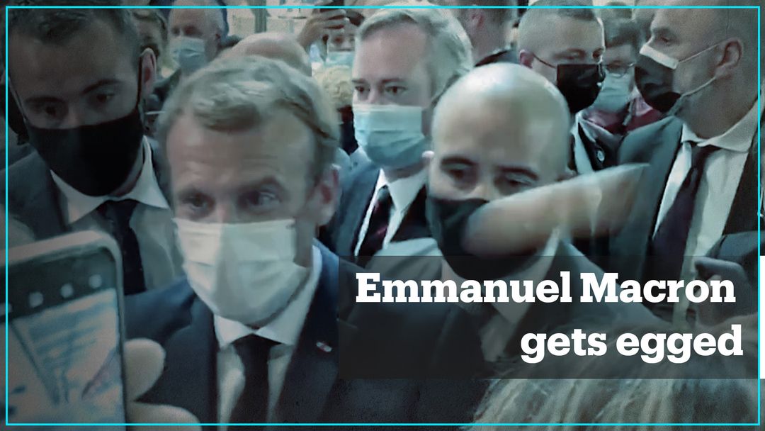 French President Emmanuel Macron gets egged on his way to Lyon