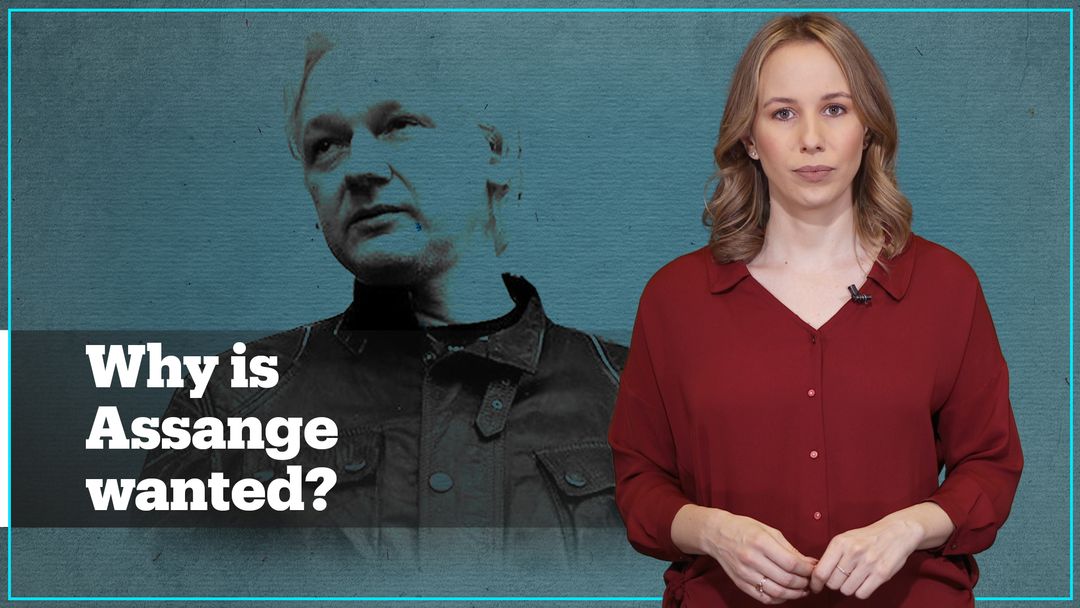 Why is Julian Assange a wanted man?
