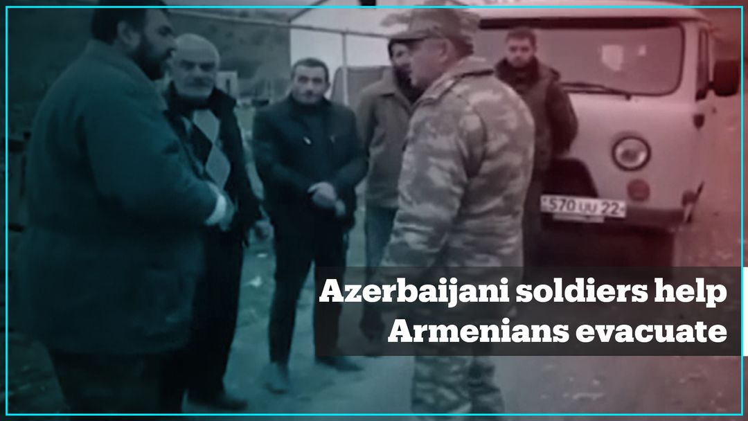 Azerbaijani soldiers help Armenian villagers in Aghdam evacuate