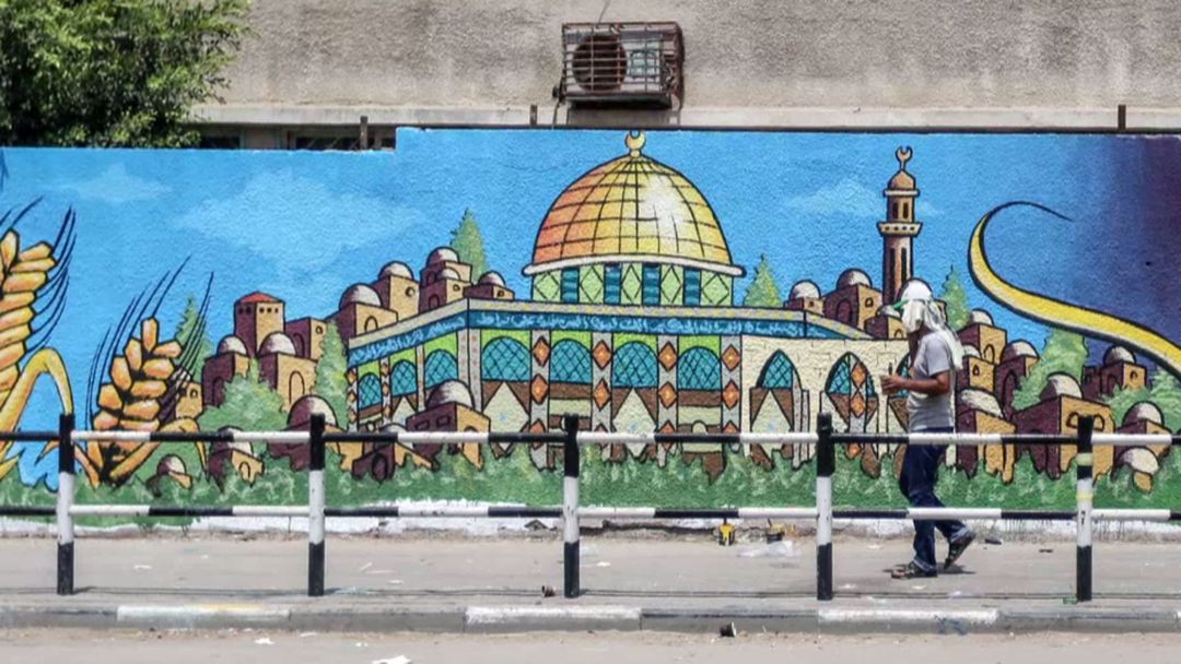 Palestinian artists paint Gaza streets in protest
