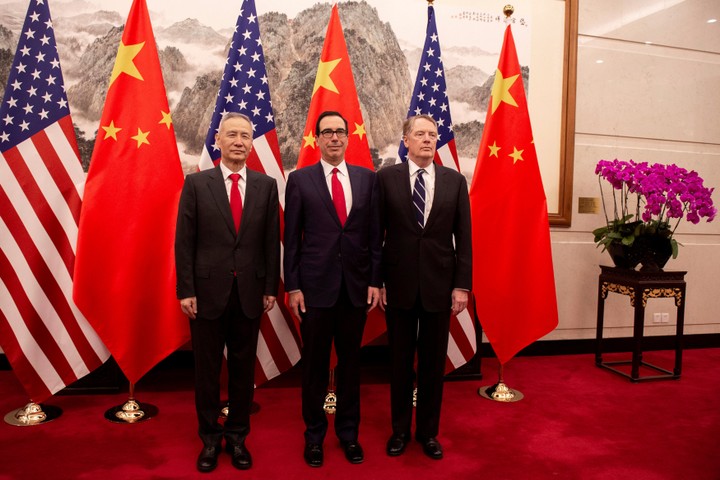 China's Vice Premier Liu He (L) pose for a photo with US Treasury Secretary Steven Mnuchin (C) and US Trade Representative Robert Lighthizer (R) at Diaoyutai State Guesthouse in Beijing on March 29, 2019.