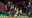 Croatia's Luka Modric, centre, celebrates between Scotland's John McGinn, left, and Scotland's Callum McGregor, right, after the Euro 2020 soccer championship group D match between Croatia and Scotland at the Hampden Park Stadium in Glasgow, Tuesday, June 22, 2021