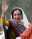 Benazir Bhutto waves to her supporters as she arrives at city court to submit her nomination papers for parliamentary election, Monday, November 26, 2007 in Larkana, Pakistan.