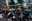 Environmental activists block the entrance of the French bank Societe Generale headquarters during a 