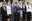 French President Nicolas Sarkozy, foreground center, gestures as he poses for a group photo along with the seven female members of his government, and the Prime Minister Francois Fillon, third left, after the first Cabinet meeting, Friday, May 18, 2007 at the Elysee Palace in Paris.