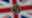 In this file photo taken on December 14, 2017 a British one pound sterling coin is arranged for a photograph in front of a Union flag in London.