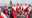 People dressed as Santa Claus take part in the World Santa Claus Congress, an annual event held every summer at the amusement park, in Copenhagen, Denmark, July 24, 2017. 