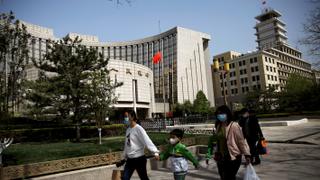 China's central bank cuts key lending rates amid economic woes