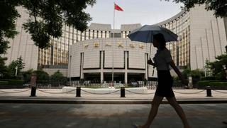 China's central bank cuts key lending rates to boost economy
