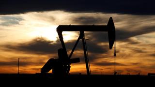 Oil prices fall to seven-month lows as demand weakens