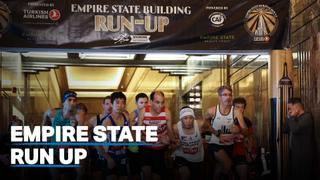 Group of athletes run up the Empire State Building's staircase