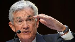 Markets sink after Federal Reserve Chairman promises further rate hikes