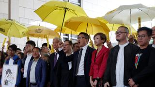 Hong Kong Democracy: Trio plead not guilty to public disorder charge