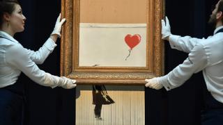 Partially shredded Banksy painting sells for record $25.4M | Money Talks