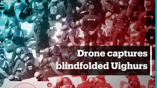 Footage shows Uighurs blindfolded, handcuffed in masses