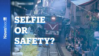 Selfie or safety? Selfie-seeking tourists are banned from the famous old railway of Hanoi.