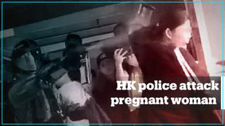 Pregnant woman attacked by Hong Kong police