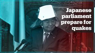 Japan parliament prepares for quake with foldable helmets