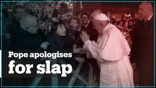 Pope says sorry for slapping devotee who grabbed his hand