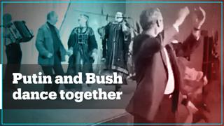 Archive footage shows Putin and Bush dancing together