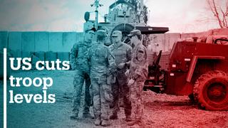 US cuts troop levels in Afghanistan and Iraq, but stops short of a full pull-out