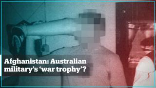 Australian soldier drinks beer out of dead Afghan militant's prosthetic leg