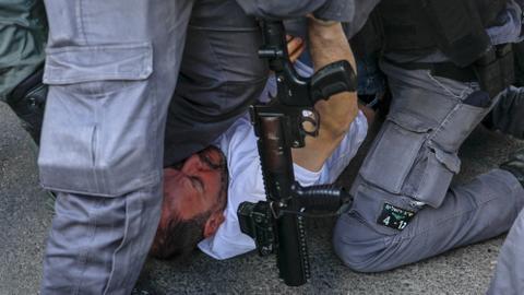 Israeli police beat lawmaker at eviction protest in east Jerusalem