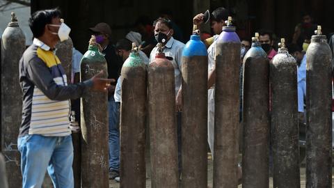 India sees new record rise in cases amid oxygen shortage ...