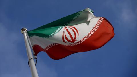 American held in Iran allowed to leave, son freed from detention: UN
