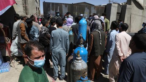Afghanistan running out of oxygen as Covid surge worsens – latest updates