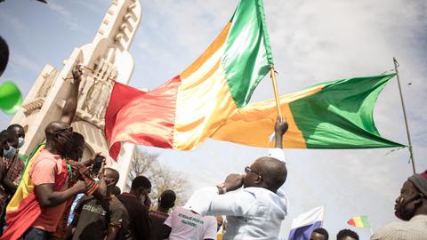 Malians in thousands protest African bloc sanctions on junta