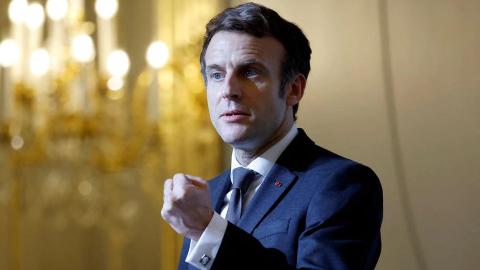 Ahead of election, Macron bets on rosy French economy