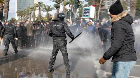 Activists report first death in street protests against Tunisia leader