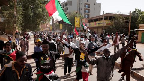 Sudanese forces fire tear gas as thousands rally against post-coup killings