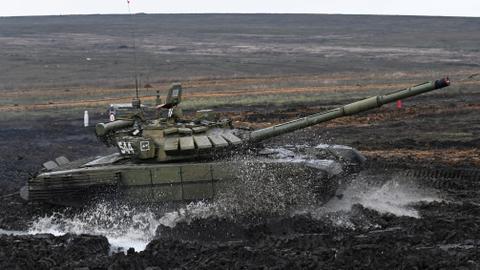 Ahead of four-way Ukraine talks, Russia launches new military drills