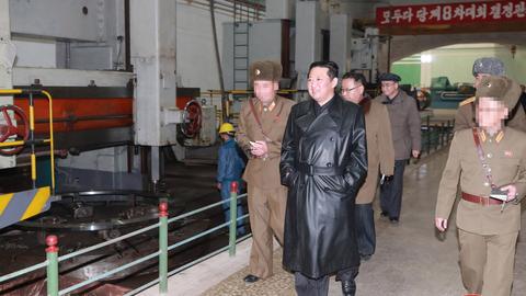 N.Korea confirms missile tests, Kim praises 'important' munitions factory