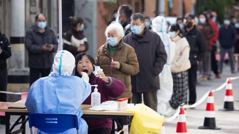 Shanghai lockdown: Millions face tougher curbs as Covid-19 cases surge