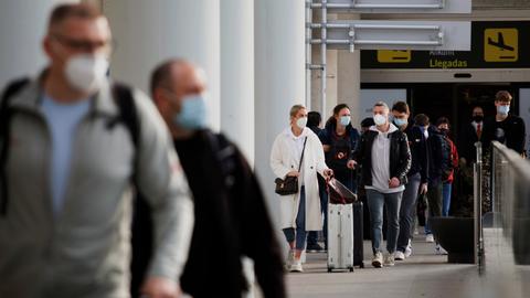 EU removes mask requirement for air travel as Covid cases decline