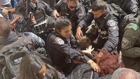 US 'deeply troubled' by Israeli assault on Palestinian journalist's funeral