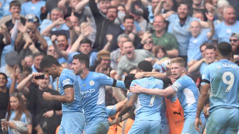 Man City produce dramatic comeback to retain Premier League title