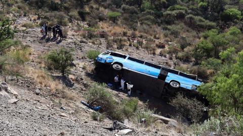 Bus crash in central Mexico kills and injures migrants