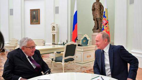 Is Henry Kissinger proposing to divide Ukraine?