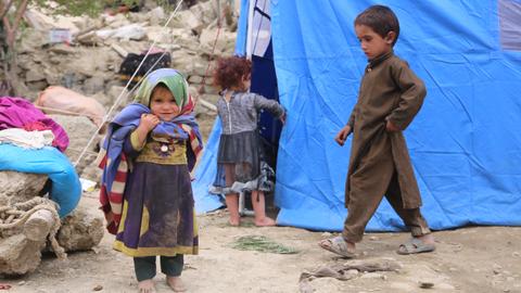 Afghan quake survivors suffer as aid hampered by floods