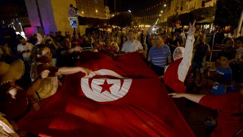 Saied supporters joyous as Tunisia backs new constitution amid low turnout