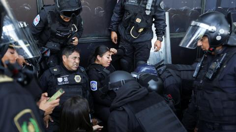 Mexico protesters face off with police in violent demonstration