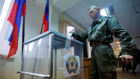 Live blog: Ukraine 'retakes' territory in east as annexation polls open