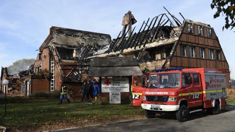 The arson attack by a suspected neo-Nazi burns down a refugee camp in Germany