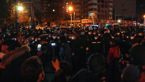 China Covid cases hit new high after weekend of protests over lockdowns