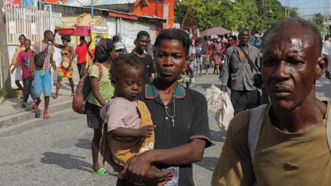 'Gangsters' kill residents, burn homes in Haiti town