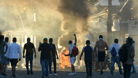 Bolivians burn cars, buildings as anger widens over Camacho’s arrest